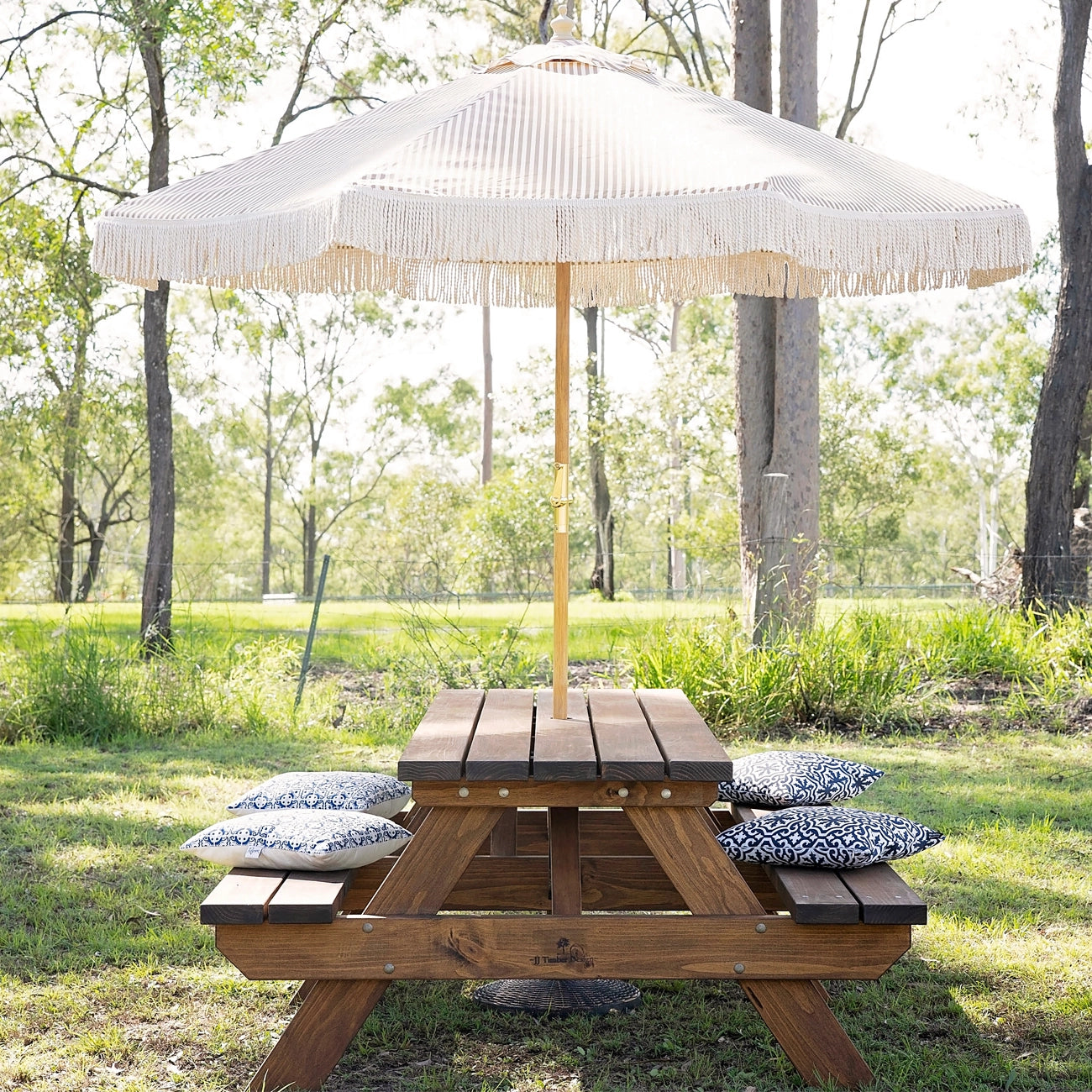 Angled product view of JJ Timber 2.4m heavy duty picnic table with umbrella.
