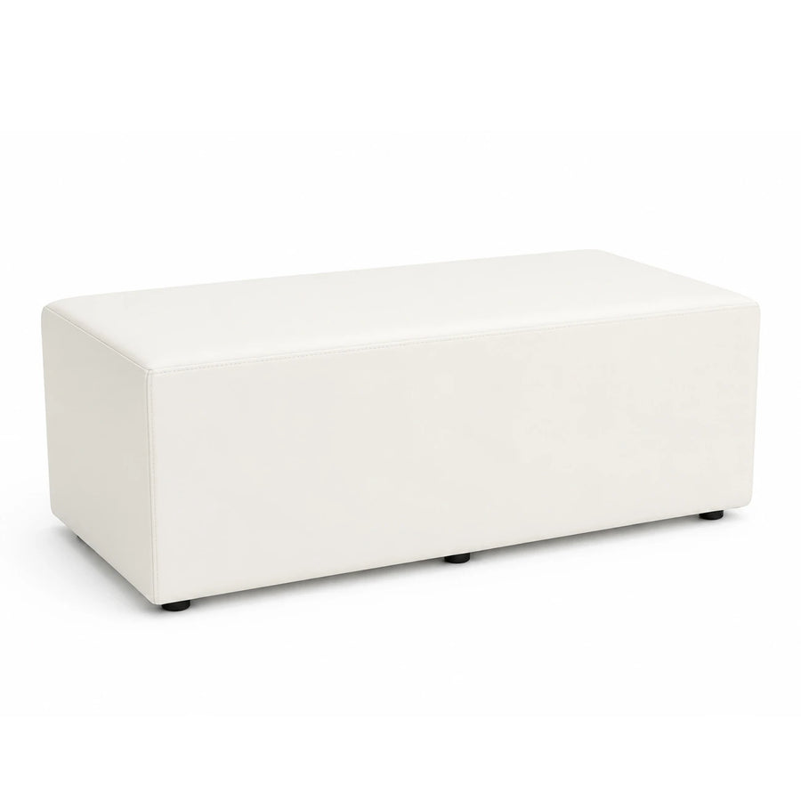 A modern rectangular ottoman with a smooth, off-white faux leather or vinyl upholstery, shown from a three-quarters angle on a plain white studio background. JJ Timber Design Commercial Products