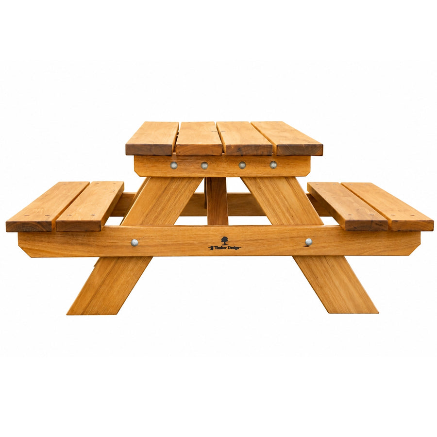 A Child Sized compact wooden picnic table with integrated benches, made from warm medium-brown wood with small silver metal fasteners, shown on a plain white background. JJ Timber Design 