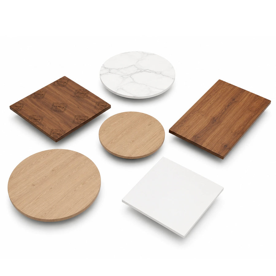 Six square and round table tops in various materials and colors, including wood grain, marble, and solid white, arranged on a clean white background. JJ Timber Design Commercial Products