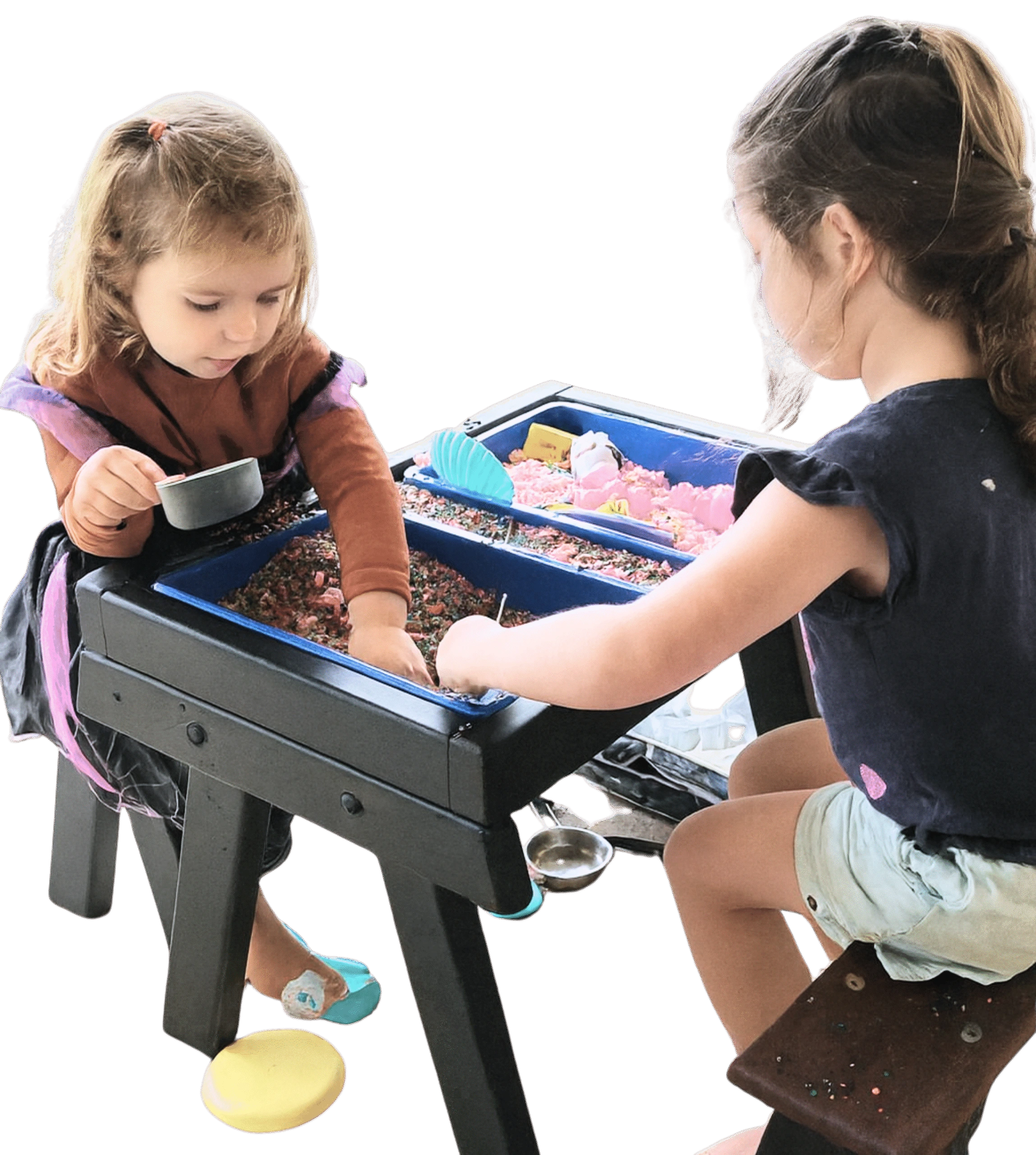 Two children using a JJ Timber Design sensory activity table.